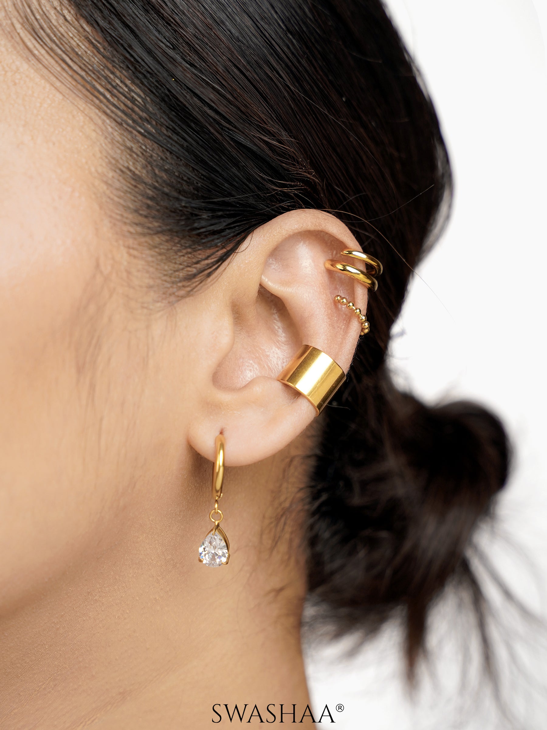 Arven Bold 18K Gold Plated Ear Cuffs, Autumn Solitaire Pear Shaped Cubic Zirconia Drops 18K Gold Plated Hoop Earrings, Cairo Beads 18K Gold Plated Ear Cuffs, Elion Sleek Double Band 18K Gold Plated Ear Cuffs