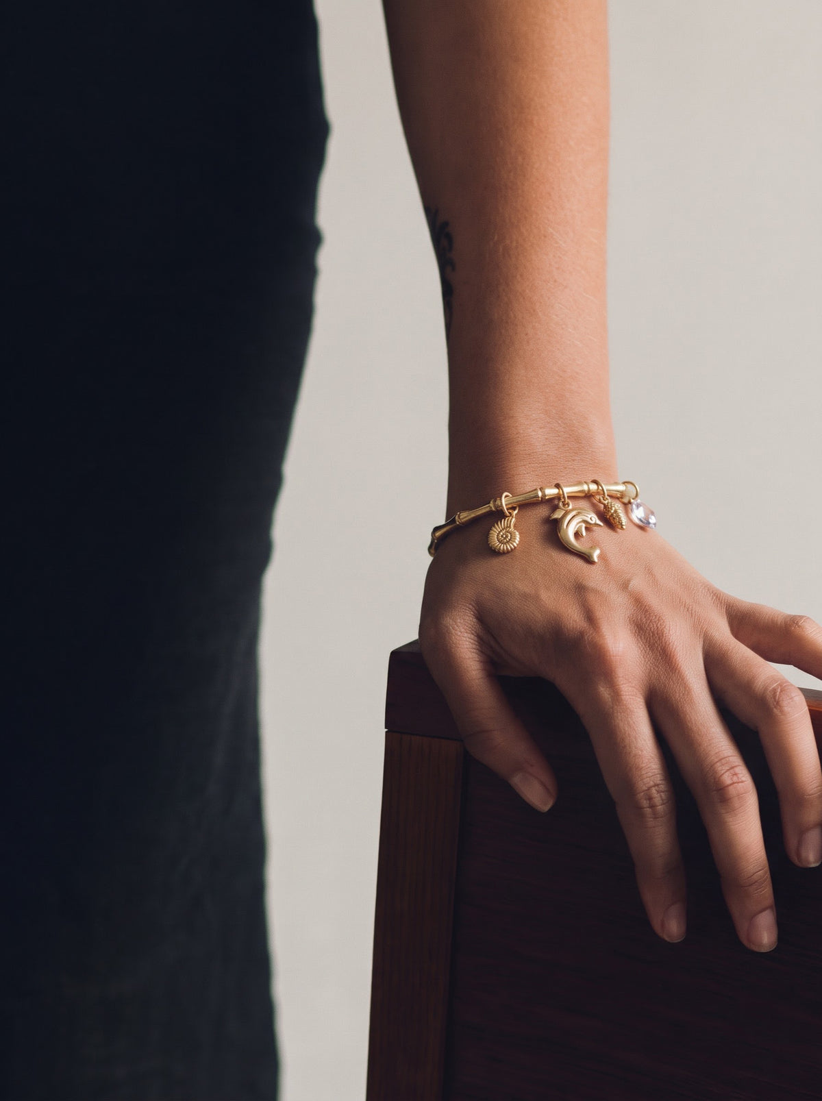 Elara Dolphin Motif, Shell Accents, Sparkling Drop Charms 18K Gold Tone Plated Women's Band Bracelet