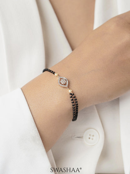 Amine Sparkling Flower Diamond Eye Rosegold Plated Mangalsutra Bracelet