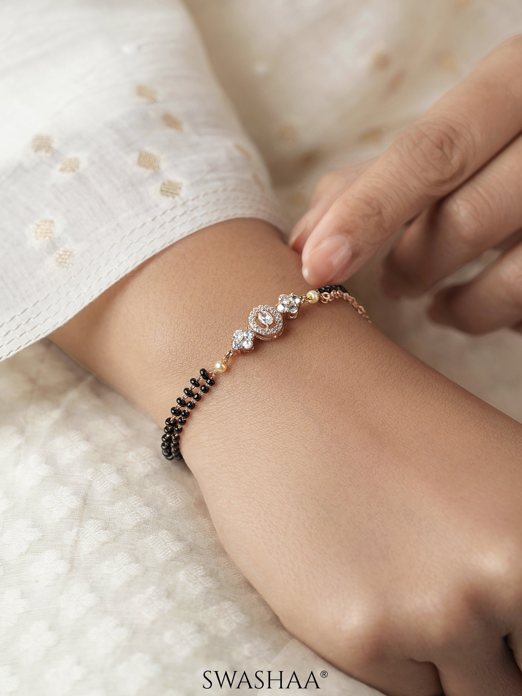 Sakhi Sparkling Diamonds Flower Charm Double Layered Rosegold Plated Mangalsutra Bracelet