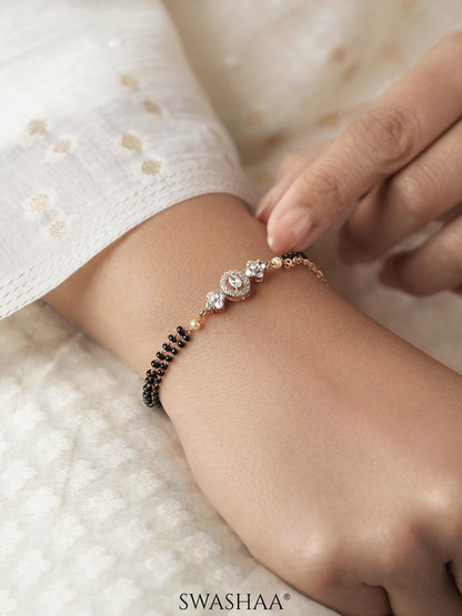 Sakhi Sparkling Diamonds Flower Charm Double Layered Rosegold Plated Mangalsutra Bracelet