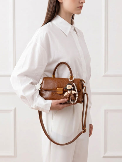Serena Brown Gloss Leather Mini Bag - Swashaa