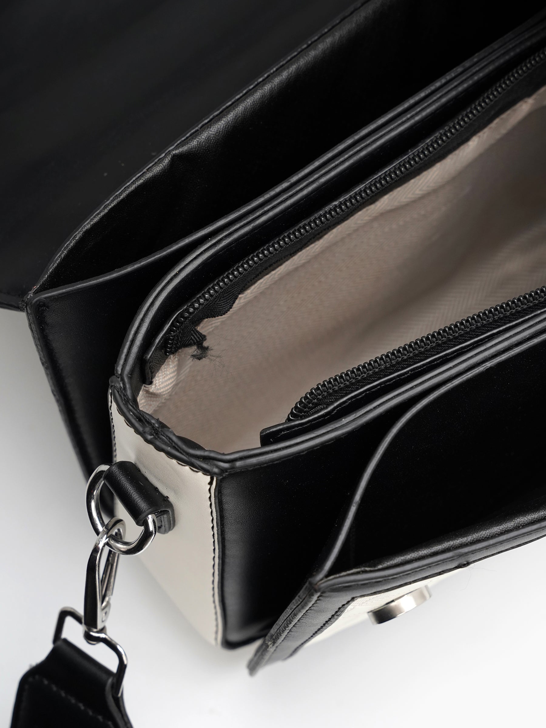 Zavira Black - White Leather Sling Bag - Swashaa